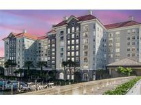 Stunning condo complex with red roof, beautiful windows and palm tree landscaping at 700 S Harbour Island Blvd # 731, Tampa, FL 33602