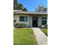 Inviting home featuring a well-manicured lawn and a welcoming entryway, great for curb appeal at 2714 60Th Avenue W Ter # 12D, Bradenton, FL 34207