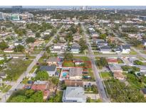 Aerial view of a neighborhood featuring charming homes, green spaces, and an inviting community atmosphere at 4001 W Carmen St # 1/2, Tampa, FL 33609