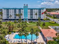 Resort style living at this condo, with a pool and lush landscaping at 10216 Regal Dr # 409, Largo, FL 33774
