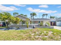 Charming single-story home with manicured landscaping and a freshly painted exterior at 8433 101St Ave, Seminole, FL 33777
