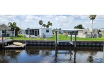 Waterfront homes with boat lifts and docks, offering convenient access to the water and outdoor recreation at 134 W Saint Annes Cir, Apollo Beach, FL 33572