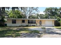 Charming single-story home with well-maintained landscaping and inviting curb appeal at 2271 Terrace N Dr, Clearwater, FL 33765