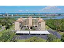 Beautiful waterfront condo complex with ample parking and gorgeous ocean views at 9000 Commodore Dr # 606, Seminole, FL 33776