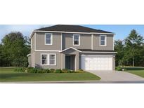 Charming two-story home featuring a manicured lawn, attached garage, and neutral gray siding at 11977 Brae Way, Dade City, FL 33525