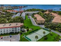 Beautiful waterfront community with lush landscaping, tennis courts, and stunning views of the bay at 2700 Bayshore Blvd # 5210, Dunedin, FL 34698