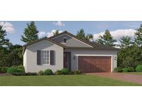Charming single-Gathering home with a well-manicured lawn and a two-car garage at 31856 Griffin Sands Ln, San Antonio, FL 33576