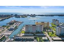 Beautiful waterfront condos on the Gulf Coast with boat docks and stunning ocean views on a clear sunny day at 4550 Cove Cir # 1003, St Petersburg, FL 33708