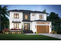 Modern two-story home with a sleek design, manicured lawn, and a stylish wooden garage door at 6214 S Foster Ave, Tampa, FL 33611