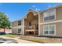 Condo with neutral paint, trimmed windows, and well-kept landscaping for low-maintenance living at 9481 Highland Oak Dr # 1511, Tampa, FL 33647