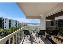 Balcony seating offers lovely views of the waterfront and community at 19925 Gulf Blvd # 407, Indian Shores, FL 33785