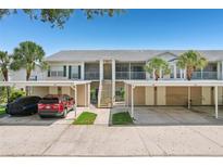 Inviting condo with assigned parking and landscaped surroundings providing a comfortable living experience at 404 Laurel Lake Dr # 101, Venice, FL 34292