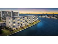 Stunning waterfront condo building offering beautiful bay views at sunset at 6075 Shore S Blvd # 215, Gulfport, FL 33707