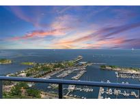 Breathtaking view of the marina and waterfront with a colorful sky at sunset at 100 1St N Ave # 2703, St Petersburg, FL 33701