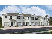 Charming townhome with a well-maintained lawn and an attached one car garage at 3510 Marigold Patch Ct, Plant City, FL 33565