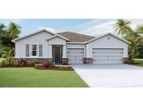Charming single-Gathering home with a stone accent, neutral colors, and an attached two-car garage at 4026 Harvest Hearth Pl, Plant City, FL 33565