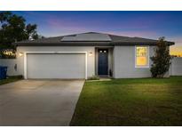 Charming single-Gathering home boasting a well-manicured lawn and solar panels for energy efficiency at 11123 Thornberry Dr, Spring Hill, FL 34609