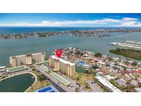 Aerial view of the condo complex near the intercoastal waterways and beachfront of Florida at 4725 Cove Circle # 908, St Petersburg, FL 33708