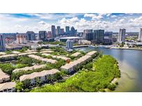 Beautiful aerial view of waterfront condo community near downtown Tampa and bay with lush landscaping at 746 Coral Reef Dr # 746, Tampa, FL 33602