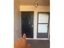 Secured front door with security gate for added peace of mind at 7522 Needle Leaf Pl # 28, Tampa, FL 33617