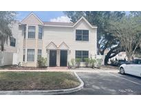 Inviting townhouse with classic architecture, neat landscaping, and convenient parking at 2302 Maki Rd # 69, Plant City, FL 33563