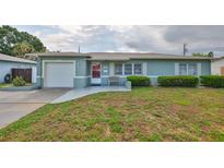 Charming single-story home featuring well-maintained landscaping and inviting curb appeal at 6401 15Th N St, St Petersburg, FL 33702