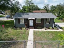 Charming single-story home boasts fresh paint, a new roof, and tidy landscaping at 37045 North Ave, Dade City, FL 33523