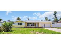 Charming single-story home with a well-maintained lawn and inviting curb appeal at 4200 49Th S Ave, St Petersburg, FL 33711