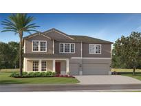Charming two-story home with a two-car garage, inviting front porch, and manicured landscaping at 11836 Blue Diamond Trl, Parrish, FL 34219