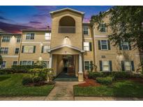 Charming condo building with lush landscaping and a private balcony offers serene outdoor living at 18533 Bridle Club Dr # 18533, Tampa, FL 33647