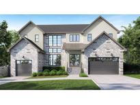 Stunning two-story home featuring a stone facade, modern windows, and a well-manicured lawn at 924 42Nd N Ave, St Petersburg, FL 33703