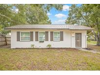 Charming single-story home with a well-maintained front yard, shutters and classic design at 1401 30Th N Ave, St Petersburg, FL 33704