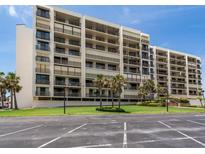 Beautiful condo building with palm trees and well-maintained landscaping in a desirable location at 1430 Gulf Blvd # 707, Clearwater Beach, FL 33767