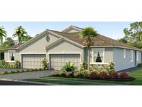 Charming single-Gathering home with a well-manicured lawn and three-car garage at 31463 Paper Birch St, Wesley Chapel, FL 33545