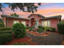 Charming single-story home boasting a beautifully landscaped front yard and inviting entrance at 6897 18Th N St, St Petersburg, FL 33702