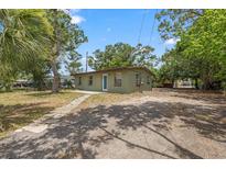 Charming one-story home with a simple facade and low maintenance yard at 9213 W Robson St, Tampa, FL 33615