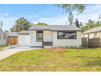 Charming single-story home boasts a well-maintained lawn and inviting curb appeal, perfect for a cozy living at 5622 Tangerine S Ave, Gulfport, FL 33707