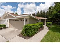 Charming single-story home with a well-maintained lawn and a two car garage at 4228 Silver Star Dr, Spring Hill, FL 34609