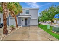 Charming townhome featuring an attached garage, well-manicured landscaping, and a welcoming entrance at 3320 Pleasant Willow Ct, Brandon, FL 33511
