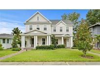 Charming two-story home with a manicured lawn and inviting curb appeal at 334 11Th Ne Ave, St Petersburg, FL 33701