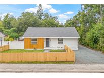 Charming renovated home with a new fence and landscaping offers great curb appeal at 731 38Th N Ave, St Petersburg, FL 33704