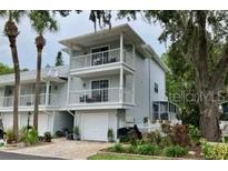 Charming two-story home with double balconies and well-maintained landscaping at 2015 Vista Del Sol # 108, Lutz, FL 33558