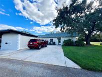 Charming single-story home with well-maintained lawn, mature landscaping and private driveway at 3725 Teeside Dr, New Port Richey, FL 34655