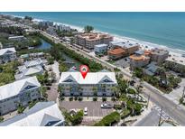 Coastal townhomes with beach access and a private parking area offer stunning views of the ocean at 204 Haven Beach Ct, Indian Rocks Beach, FL 33785