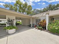Charming single-story home with a covered carport and well-manicured landscaping at 3504 Wedge Way, New Port Richey, FL 34655