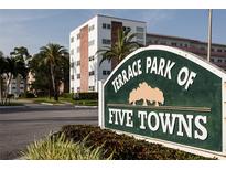 Terrace Park of Five Towns condo community sign with building and tropical landscaping visible at 6190 80Th N St # 310, St Petersburg, FL 33709