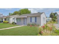 Charming single-story home boasts a well-manicured lawn and lovely curb appeal at 5048 5Th S Ave, St Petersburg, FL 33707