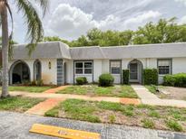 Charming single-story home with a well-kept lawn and beautiful landscaping at 4214 Trucious Pl # 4212, New Port Richey, FL 34652