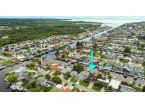 Waterfront community features beautiful canals and lush landscaping at 4931 Pelican Dr, New Port Richey, FL 34652