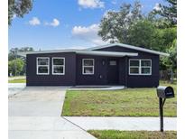 Charming single-story home with a well-maintained lawn and freshly painted exterior at 2010 4Th W Ave, Palmetto, FL 34221